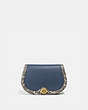 COACH®,SADDLE BELT BAG IN COLORBLOCK WITH SNAKESKIN DETAIL,Leather,Mini,Brass/Dark Denim Multi,Front View