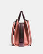 COACH®,ROGUE BAG,Pebbled Leather,Large,Black Copper/Melon,Angle View