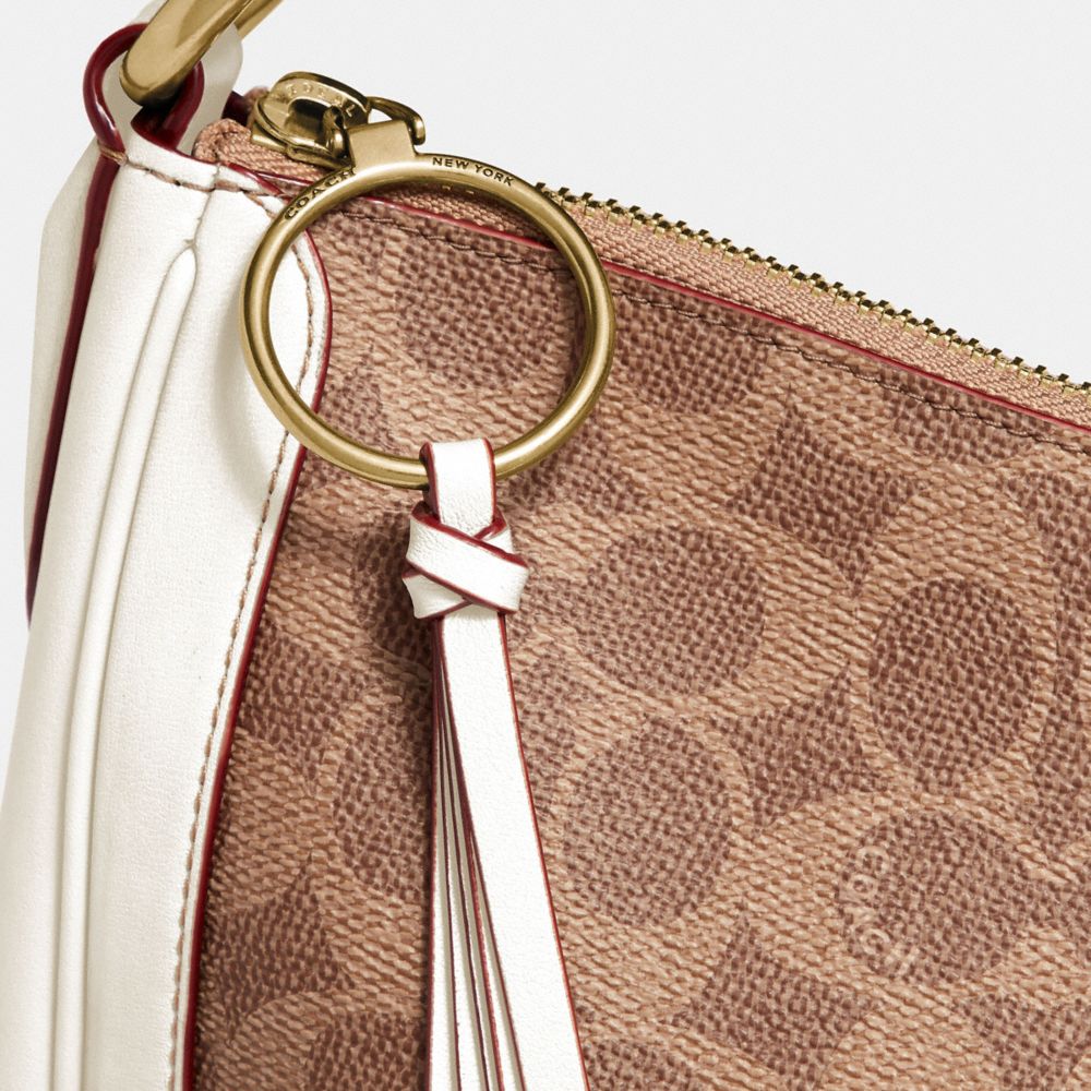 Coach signature best sale sutton crossbody