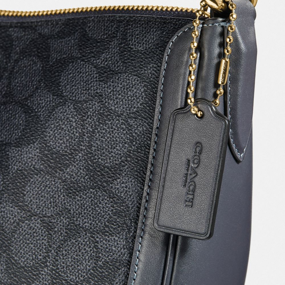 Coach sutton hobo hot sale in signature canvas