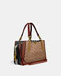 COACH®,DREAMER IN SIGNATURE CANVAS WITH SNAKESKIN DETAIL,Coated Canvas,Brass/Tan/Black,Angle View