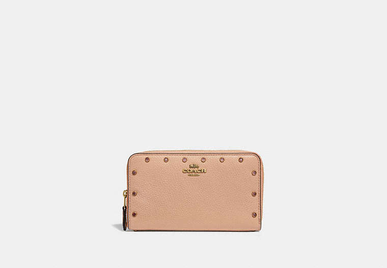 COACH®,MEDIUM ZIP AROUND WALLET WITH CRYSTAL RIVETS,Leather,Brass/Nude Pink,Front View