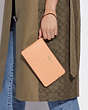 COACH®,LARGE CORNER ZIP WRISTLET,Leather,Medium,Gold/Faded Blush,Detail View