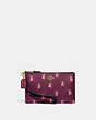 COACH®,SMALL WRISTLET WITH PARTY MOUSE PRINT,Coated Canvas,Gold/Dark Berry,Front View