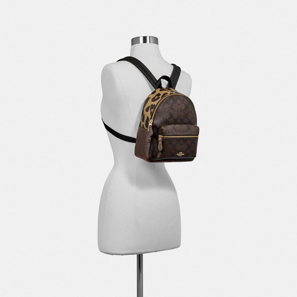 COACH Outlet Mini Charlie Backpack In Signature Canvas With