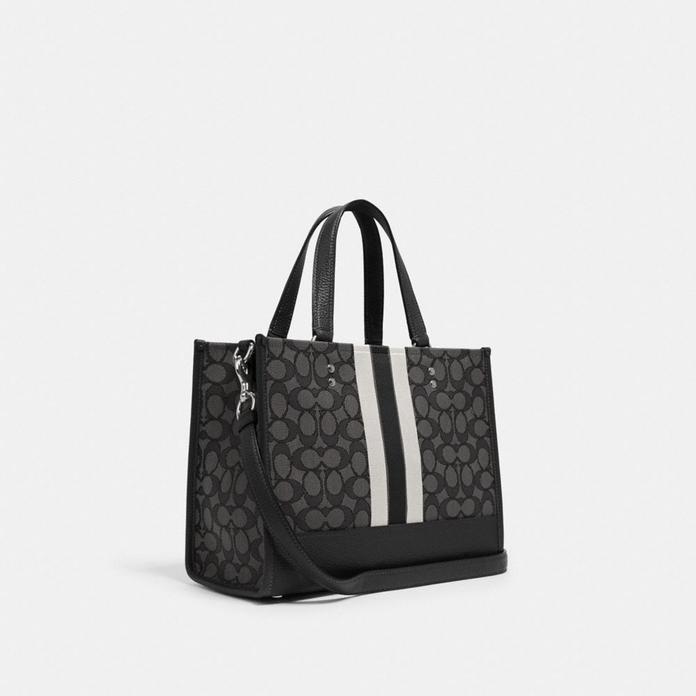 COACH®,Dempsey Carryall Bag In Signature Jacquard With Stripe And Coach Patch,,Angle View
