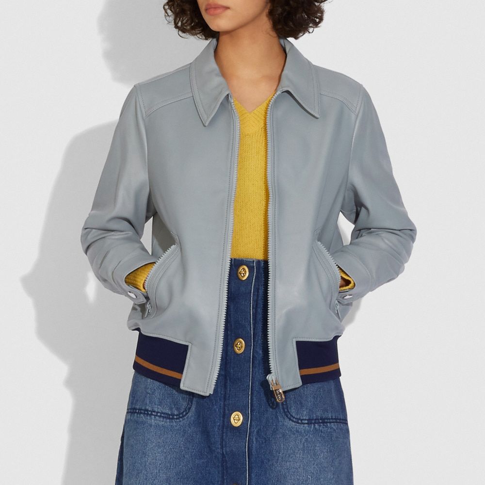 Blouson en cuir avec bord côtelé