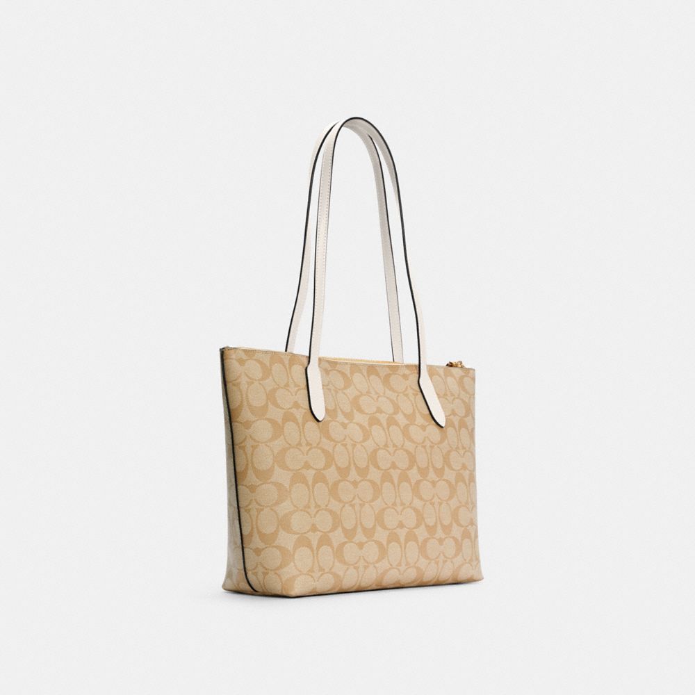 COACH®,ZIP TOP TOTE BAG IN SIGNATURE CANVAS,Signature Canvas,Large,Everyday,Gold/Light Khaki Chalk,Angle View