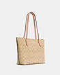 COACH®,ZIP TOP TOTE BAG IN SIGNATURE CANVAS,pvc,Large,Everyday,Gold/Light Khaki/Faded Blush,Angle View