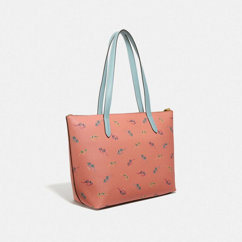 COACH®,TAYLOR TOTE WITH SUNGLASSES PRINT,Coated Canvas,Medium,Gold/Light Coral Multi,Angle View