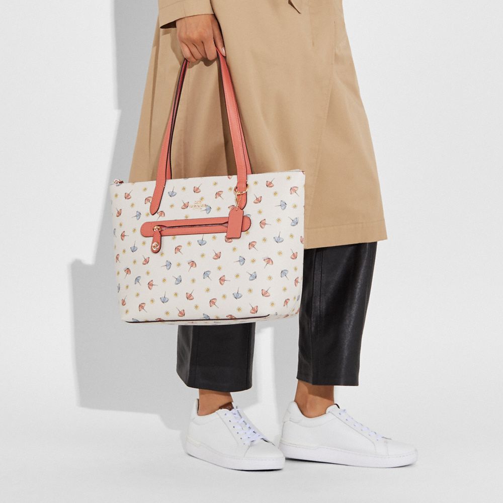 Coach fruit print taylor tote hot sale