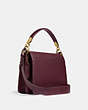 COACH®,BEAT SHOULDER BAG WITH HORSE AND CARRIAGE PRINT,Coated Canvas,Medium,Brass/Oxblood Cranberry,Angle View