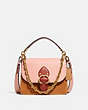 COACH®,BEAT SHOULDER BAG IN COLORBLOCK WITH RIVETS,Smooth Leather/Suede,Medium,Brass/Blush Natural Multi,Front View