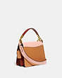COACH®,BEAT SHOULDER BAG IN COLORBLOCK WITH RIVETS,Smooth Leather/Suede,Medium,Brass/Blush Natural Multi,Angle View