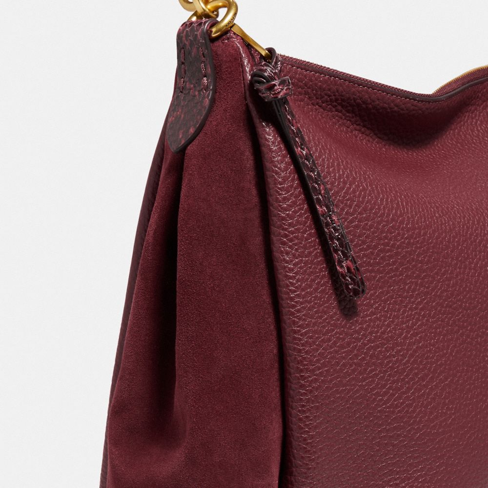 Coach shay shoulder online bag with whipstitch detail