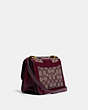 COACH®,ALIE SHOULDER BAG 18 IN SIGNATURE JACQUARD WITH SNAKESKIN DETAIL,Jacquard/Smooth Leather,Medium,Brass/Burgundy Blk Cherry,Angle View