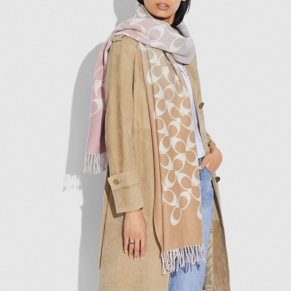 Cute signature oversized muffler from Coach, perfect for a pop of