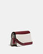 COACH®,BEAT CROSSBODY CLUTCH WITH HORSE AND CARRIAGE PRINT,Coated Canvas/Smooth Leather,Mini,Pewter/Chalk Wine,Angle View