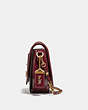 COACH®,SADDLE 24 IN SIGNATURE JACQUARD,Coated Canvas,Small,Brass/Tan/Scarlet,Angle View