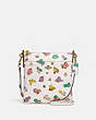 COACH®,KITT MESSENGER CROSSBODY WITH FLORAL PRINT,Pebble Leather,Mini,Brass/Chalk,Front View