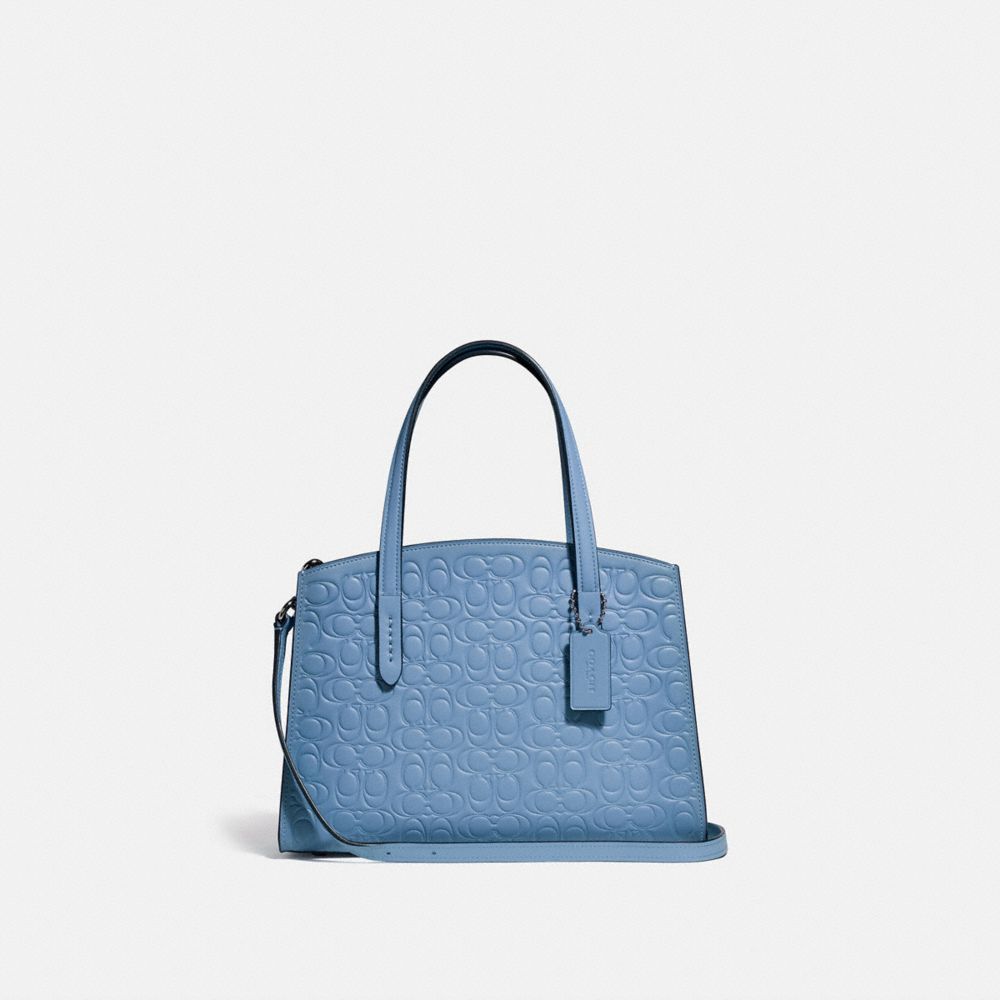 Coach charlie carryall signature leather sale