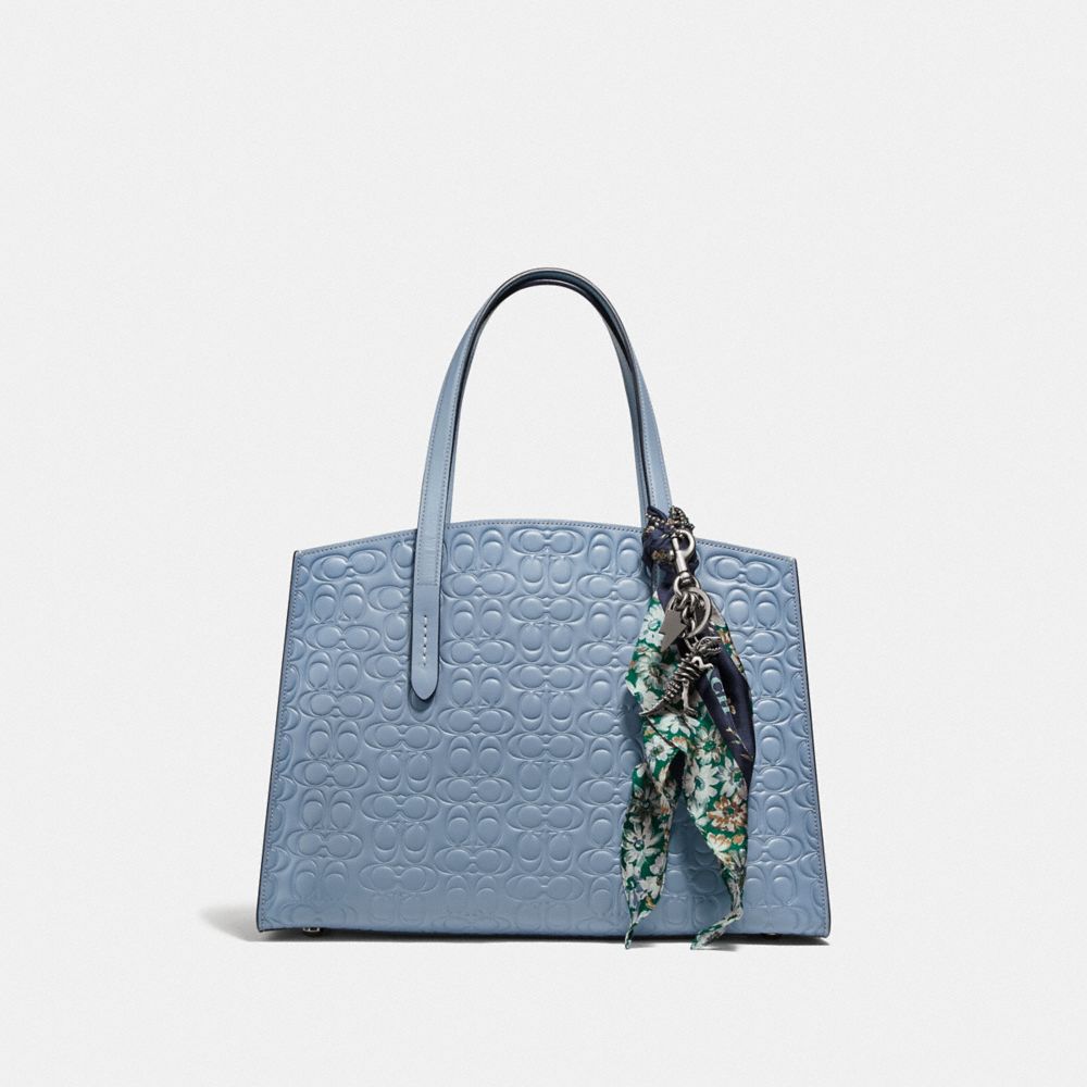 COACH®,Charlie Carryall In Signature Leather,,Angle View