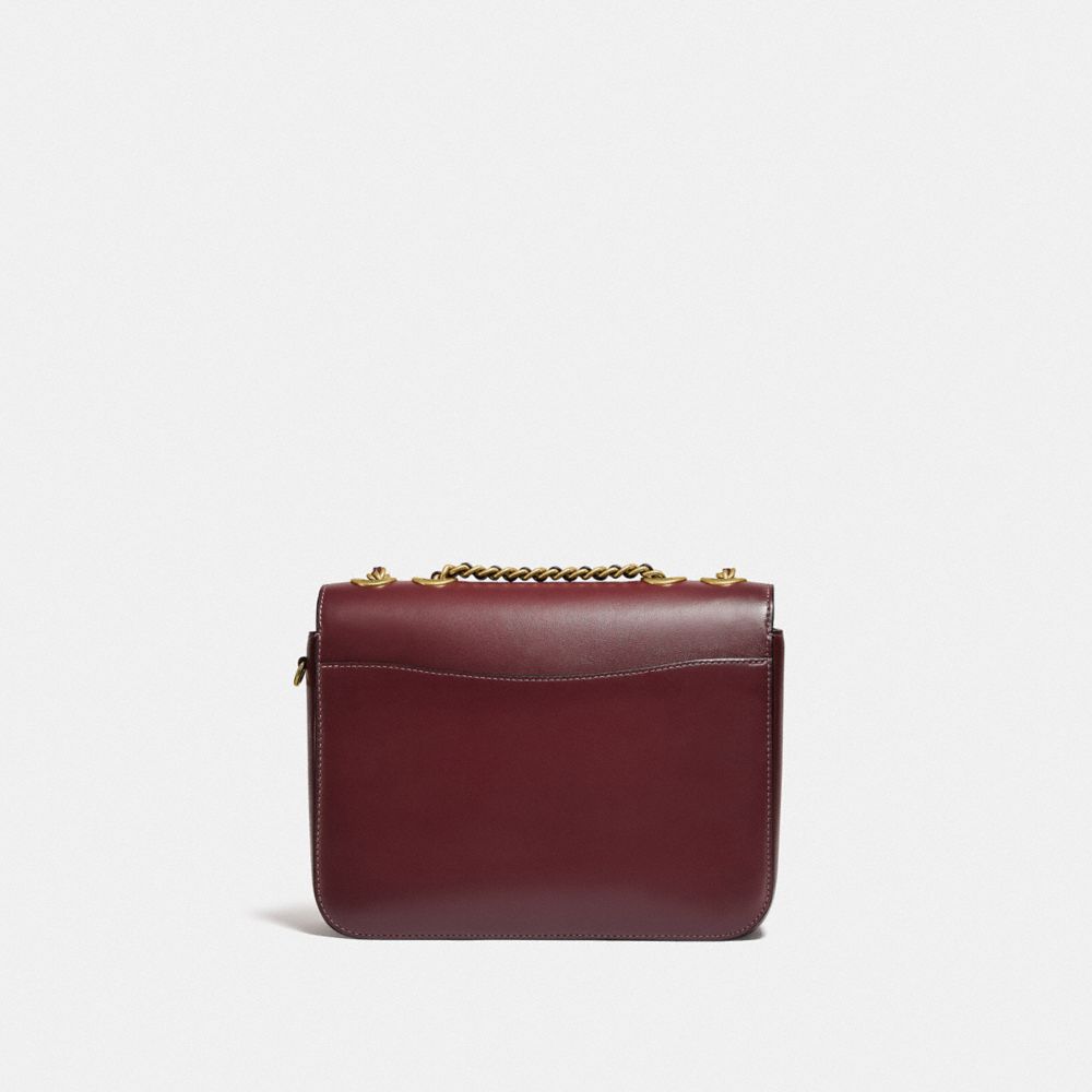 Madison leather handbag Coach Orange in Leather - 29683522