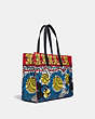 COACH®,DISNEY MICKEY MOUSE X KEITH HARING TOTE 42,n/a,Large,OL/Blue Multi,Angle View