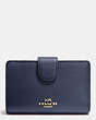 COACH®,MEDIUM ZIP AROUND WALLET IN CROSSGRAIN LEATHER,Leather,Light Gold/Navy,Front View