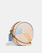 COACH®,CIRCLE CROSSBODY WITH ABSTRACT CLOUD PRINT,Coated Canvas,Small,Brass/Ivory,Angle View