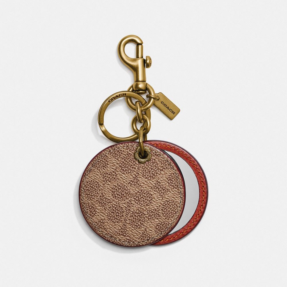 COACH®,MIRROR BAG CHARM IN SIGNATURE CANVAS,Signature Coated Canvas/Smooth Leather,Mini,Brass/Tan Sig C / Rust,Front View