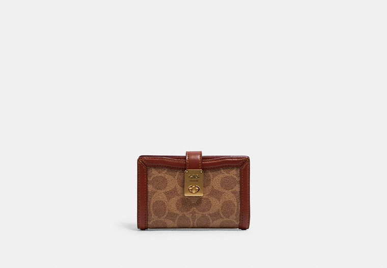 COACH®,HUTTON WALLET IN SIGNATURE CANVAS,Signature Coated Canvas/Smooth Leather,Mini,Brass/Tan/Rust,Front View