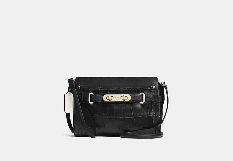 COACH®,COACH SWAGGER WRISTLET,Other Leather,Light Gold/Black,Front View