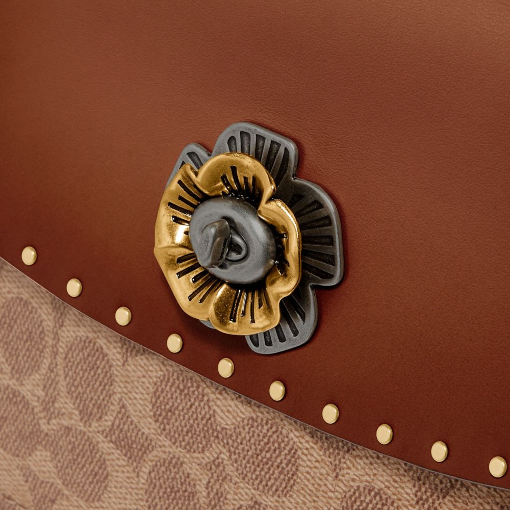 Coach parker top handle in signature canvas with rivets sale