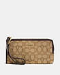 COACH®,ZIPPY WALLET IN SIGNATURE FABRIC,Logo Reps,Khaki/Brown/Light Gold,Front View