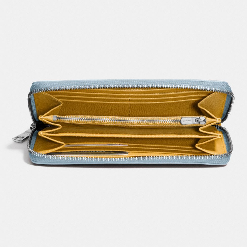 COACH Accordion Zip Wallet In Crossgrain Leather in Yellow