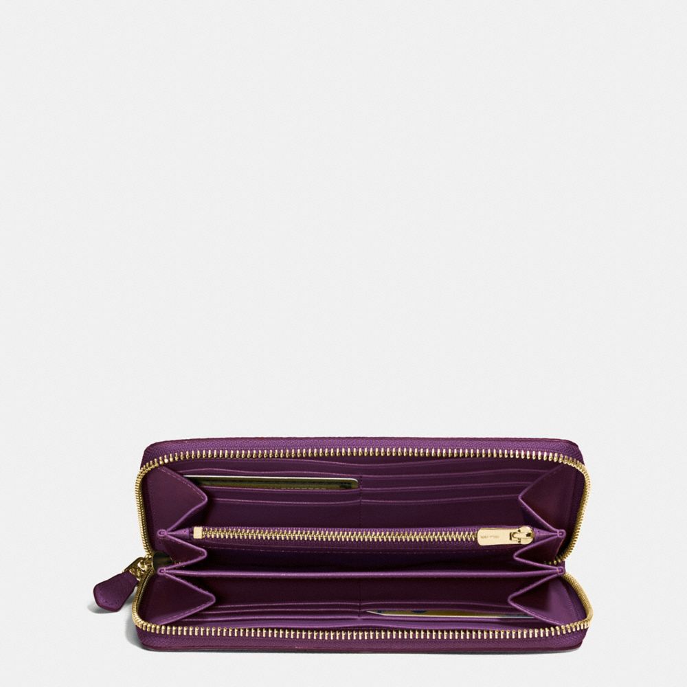 Portefeuille zippé accordéon en toile enduite à imprimé fleuri