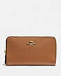 COACH®,MEDIUM ZIP AROUND WALLET IN CROSSGRAIN LEATHER,Leather,Light Gold/Saddle,Front View