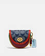 COACH®,SADDLE BAG CHARM IN SIGNATURE CHAMBRAY,Leather,Brass/Chambray Multi,Front View