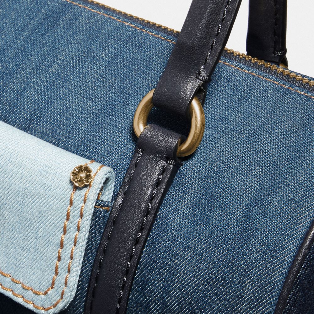 Coach denim outlet barrel bag