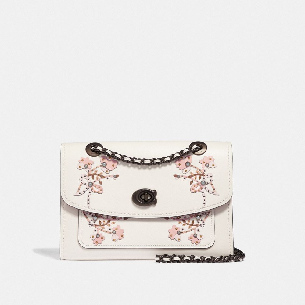 White coach purse with on sale flowers