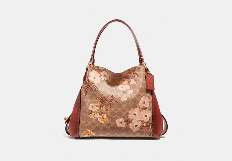COACH®,EDIE SHOULDER BAG 31 IN SIGNATURE CANVAS WITH PRAIRIE FLORAL PRINT,Coated Canvas,Large,Brass/Tan Rust Bow,Front View