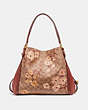 COACH®,EDIE SHOULDER BAG 31 IN SIGNATURE CANVAS WITH PRAIRIE FLORAL PRINT,Coated Canvas,Large,Brass/Tan Rust Bow,Back View