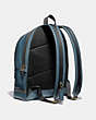 COACH®,ACADEMY BACKPACK,Leather,Large,Brass/Denim,Angle View