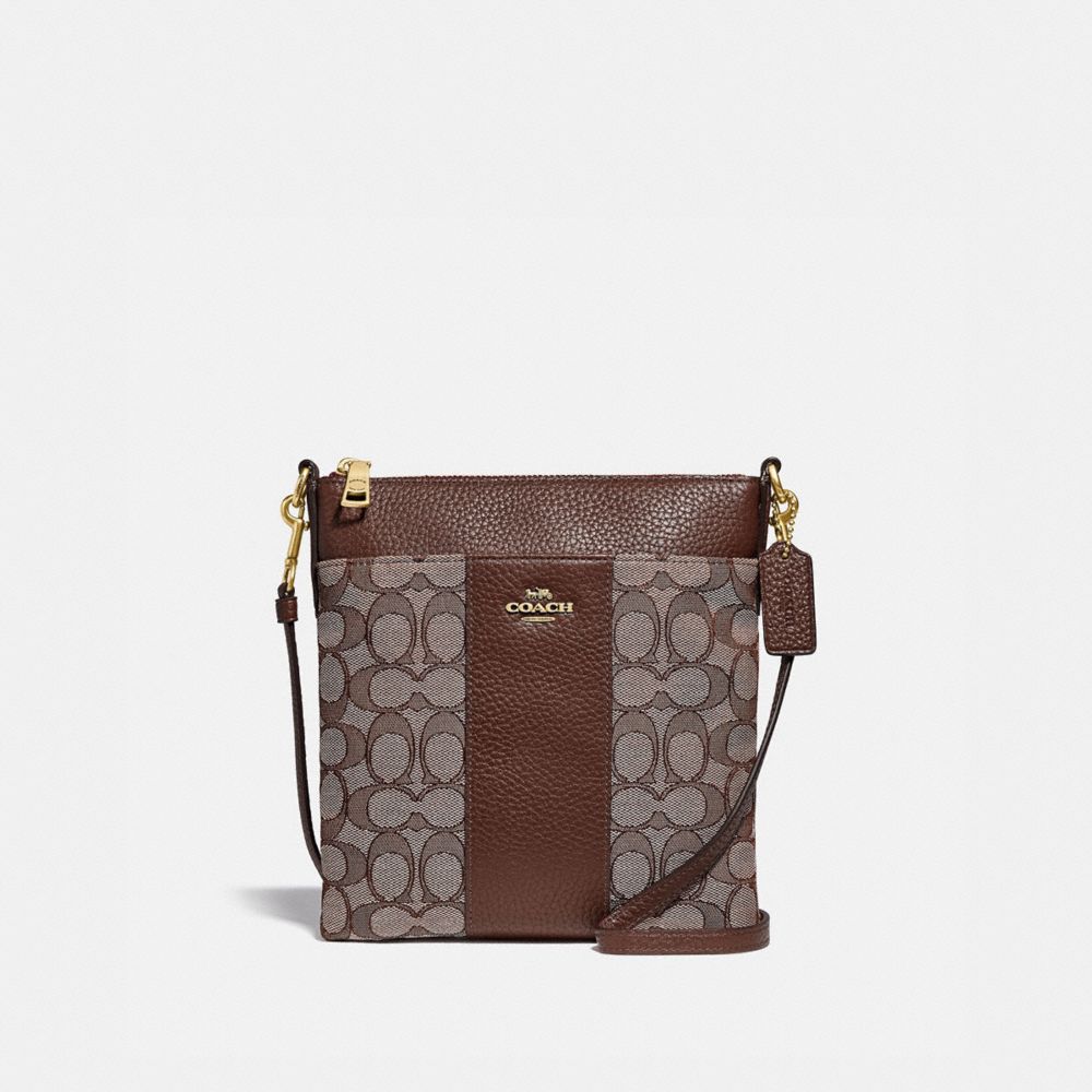 Kitt Messenger Crossbody Bag In Signature Jacquard