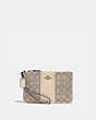 COACH®,SMALL WRISTLET IN SIGNATURE JACQUARD,cotton,Mini,Brass/Stone Ivory,Front View