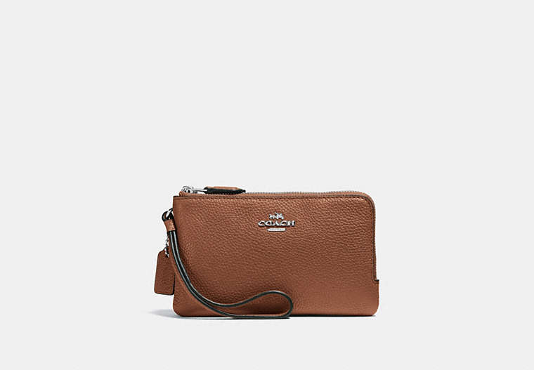 COACH®,DOUBLE CORNER ZIP WRISTLET IN POLISHED PEBBLE LEATHER,Leather,Silver/Saddle,Front View