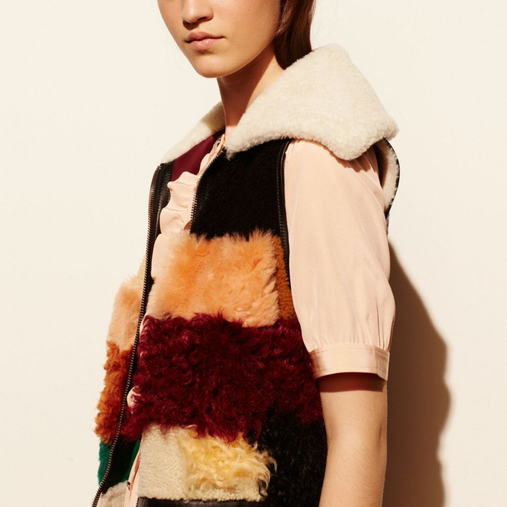 COACH®: Patchwork Shearling Vest