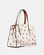COACH®,CHARLIE CARRYALL 28 WITH FLORAL PRINT,Leather,Medium,Gold/Chalk,Angle View