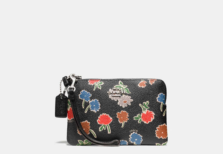 Small Wristlet In Daisy Field Print Coated Canvas